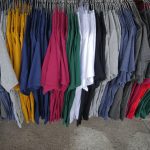 colorful-plain-casual-t-shirts-hanging-rack_1831-817